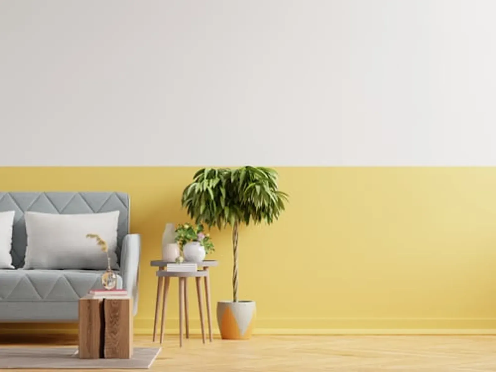 Bright living room with a soft yellow accent wall and light furnishings